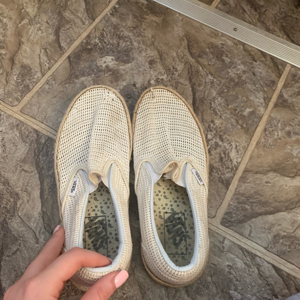 White slip on vans.